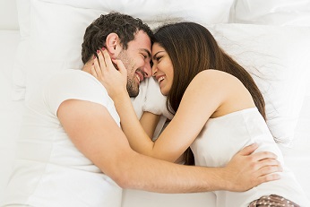 men and women in the bed after happy sex